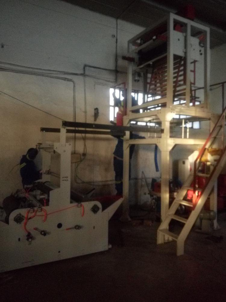 Plastics processing installation